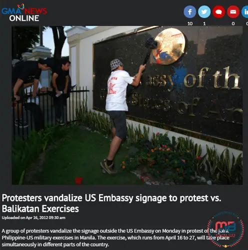 Filipinos Vandalizing US Embassy Signage